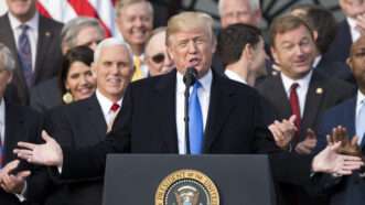 Former President Donald Trump is seen at the White House after Congress passed the Tax Cuts and Jobs Act of 2017 | Alex Edelman - CNP/Sipa USA/Newscom