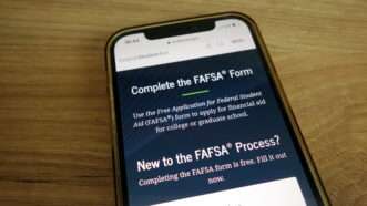 A smartphone showing the FAFSA form | Photo 220871921 © Piotr Swat | Dreamstime.com