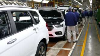 Workers on an automotive assembly line in Tianjin, China. | Ognjen Stevanovic | Dreamstime.com