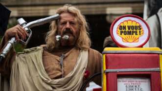 A man protests in France during a yellow vest demonstration | Telmo Pinto/ZUMAPRESS/Newscom