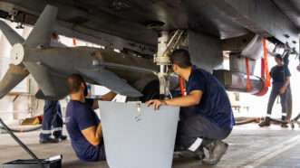 Israeli technicians arm an F-15 fighter jet with JDAM ordnance at Ramon Air Base in Israel on October 16, 2023. | Zohar Azar/Polaris/Newscom