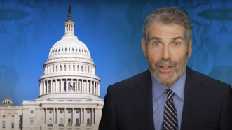 John Stossel is seen in front of the U.S. Capitol | Stossel TV